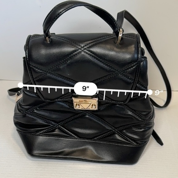 Michael Kors Serena MD Quilted Leather Flap Backpack in black. main image 4
